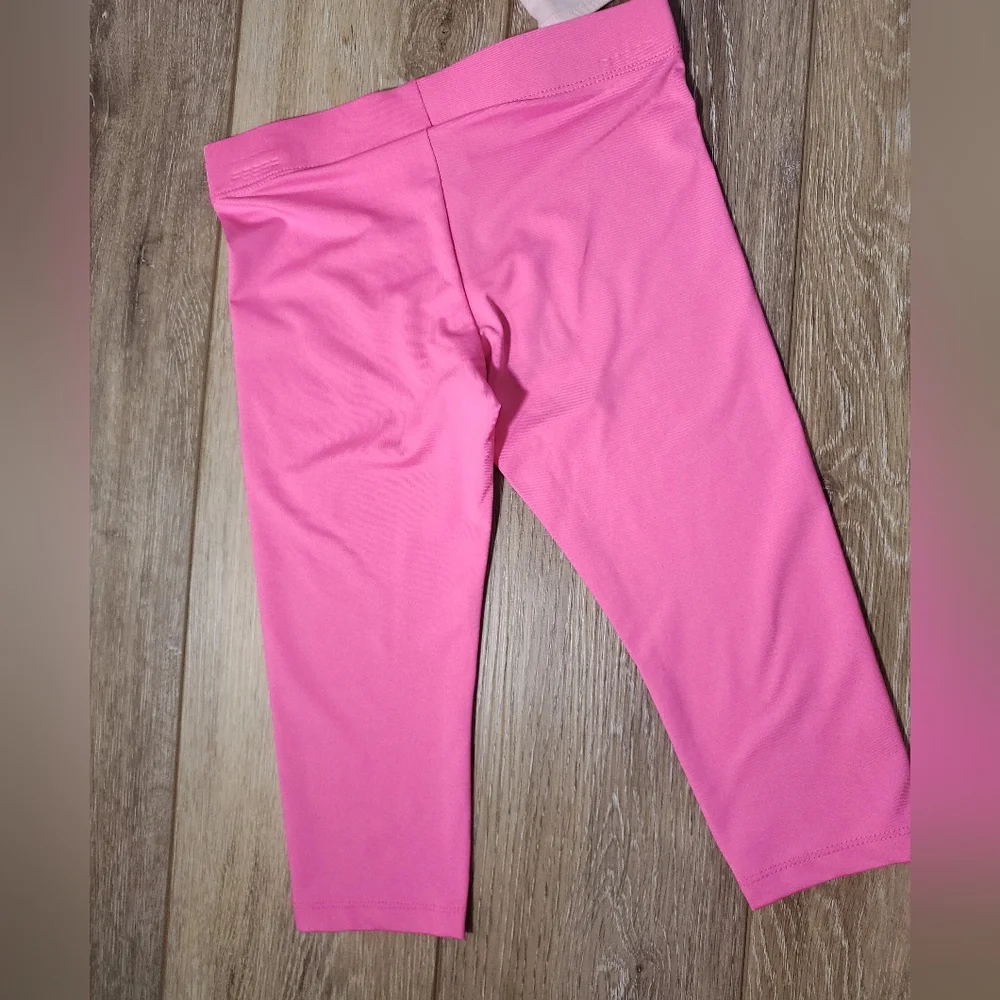Little girl's Puma dark pink capri leggings and light pink tie-front tee Size 5